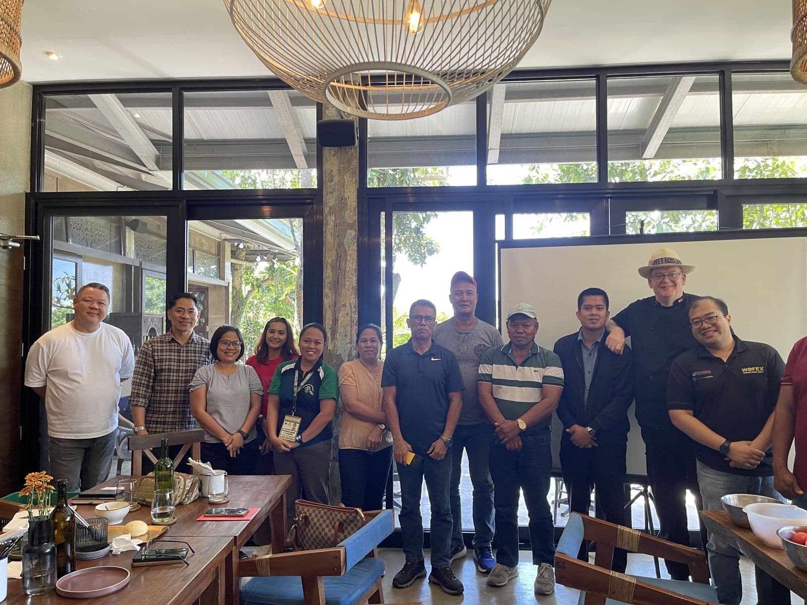 FFI team with farmer partners and food-industry buyers at a meeting