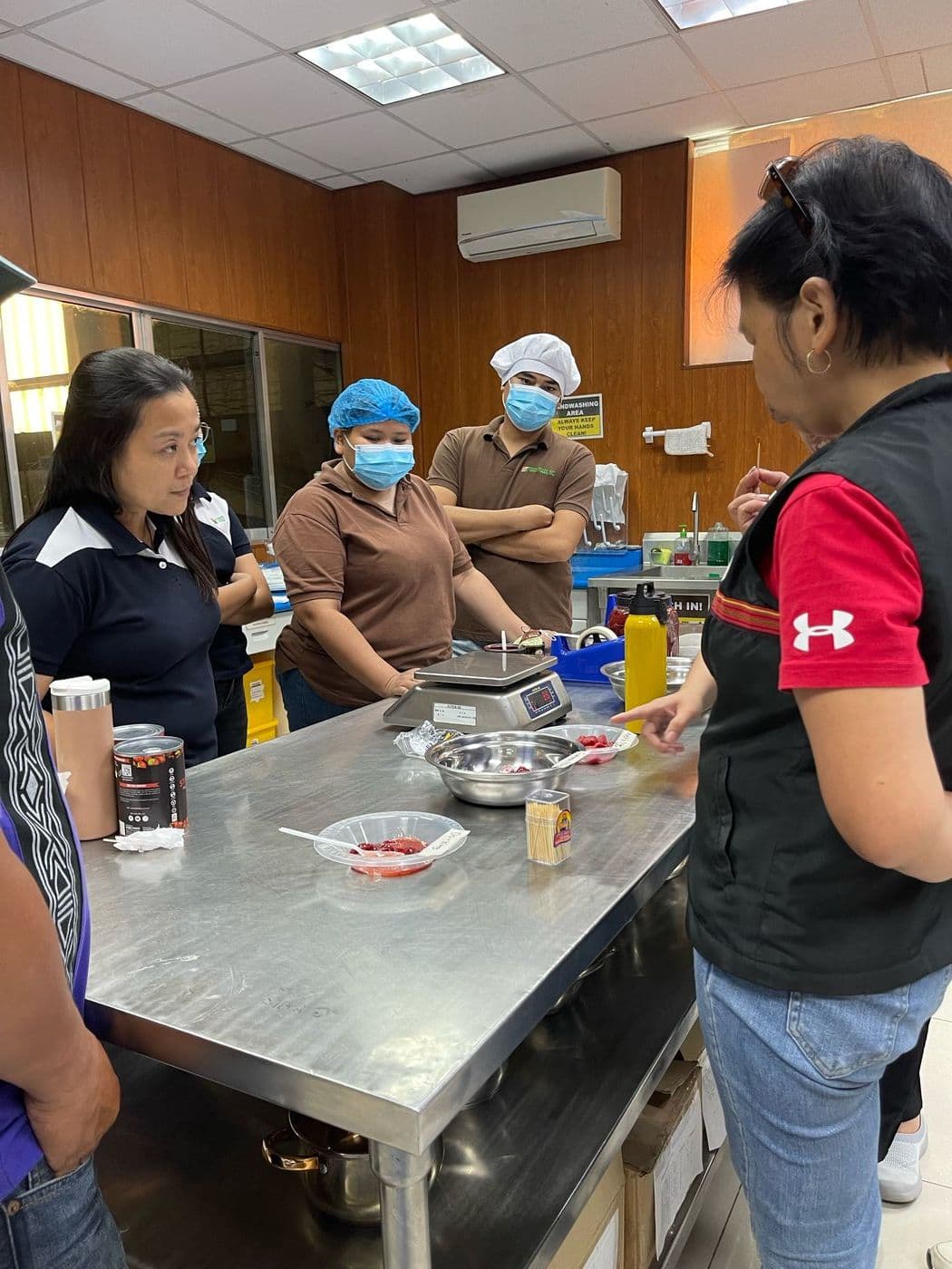 FFI team members working with a food processing facility to prepare product